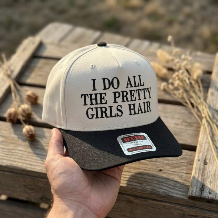 Cream and black Pretty Girls Hair two-tone trucker hat with bold front lettering