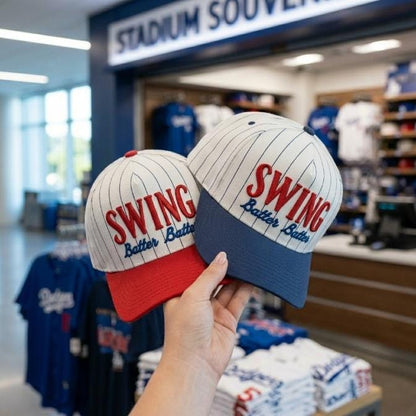 Two embroidered pinstripe baseball hats displayed in a stadium souvenir shop