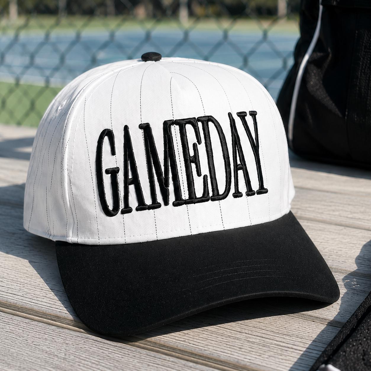White pinstripe hat with bold black GAME DAY embroidery and black brim