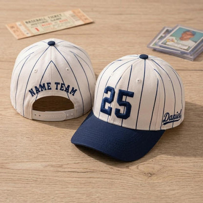 Front and back views of a pinstripe baseball hat with number 25 and name team detail