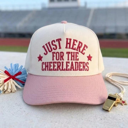 Two-tone pink and cream hat featuring Just Here for the Cheerleaders lettering