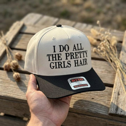 Cream and black Pretty Girls Hair two-tone trucker hat with bold front lettering