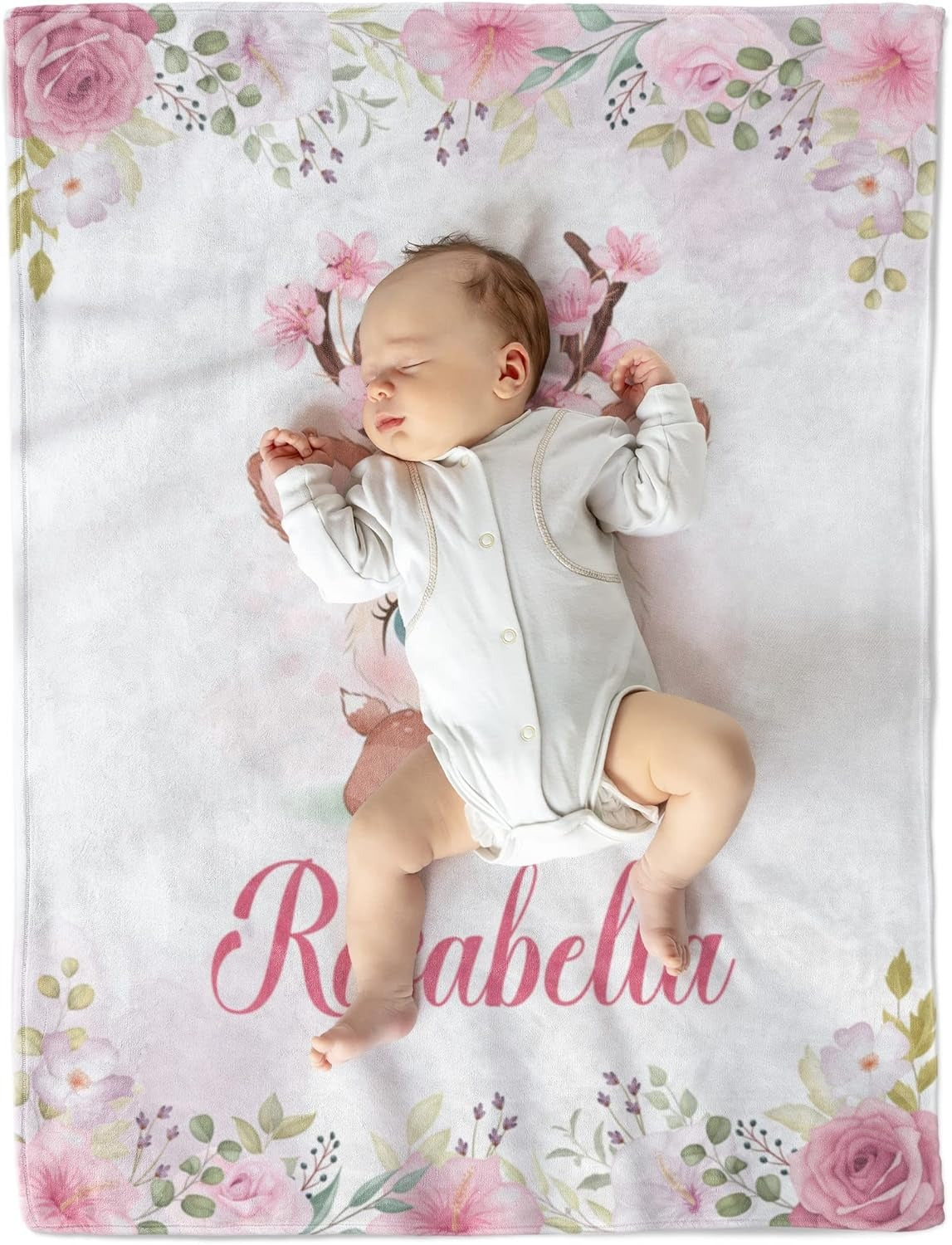 Newborn baby girl sleeping on custom baby blanket with name Rosabella, soft fleece with floral design