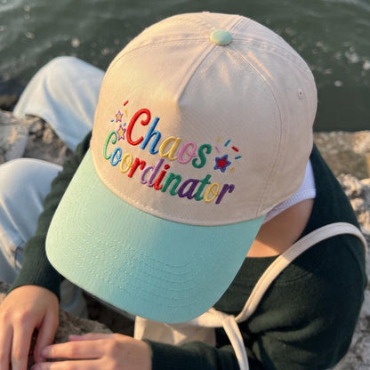 Trendy baseball cap with 'Chaos Coordinator' colorful embroidery in pastel colors, adjustable fit
