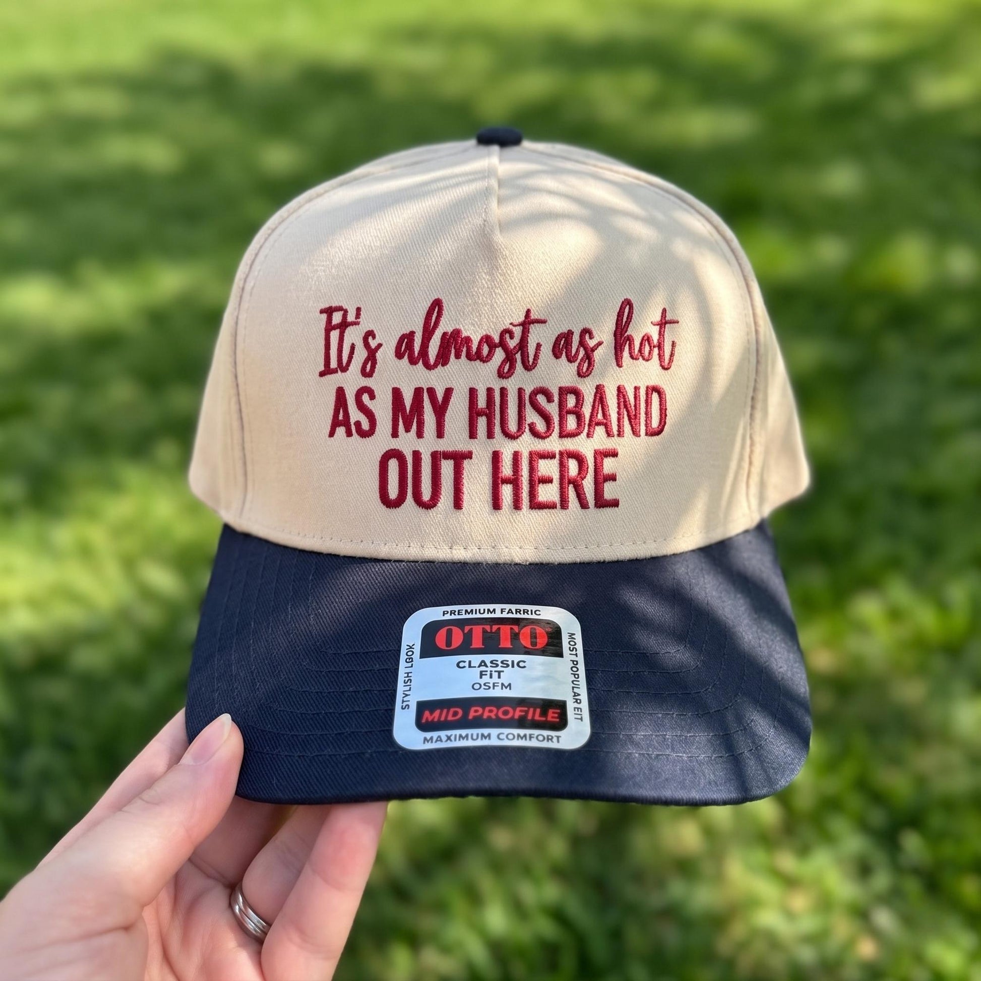 Funny tan and navy baseball cap with 'Almost as Hot as My Husband' embroidered in red lettering